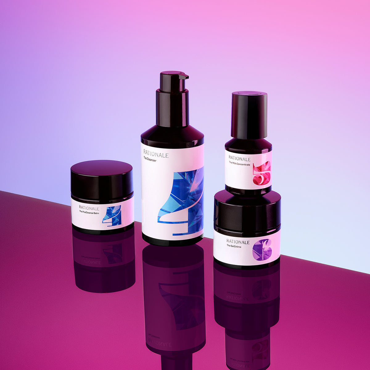 Three advanced Rationale skincare products on a reflective surface with a gradient purple and pink background