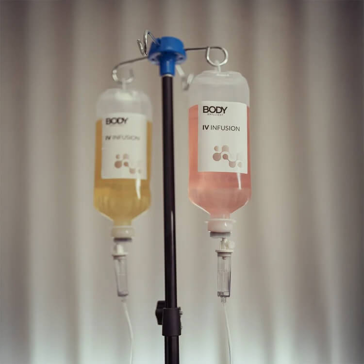 Two Body Brilliant IV infusion bags hanging on a pole at Le Petit Saint Mayfair London. 