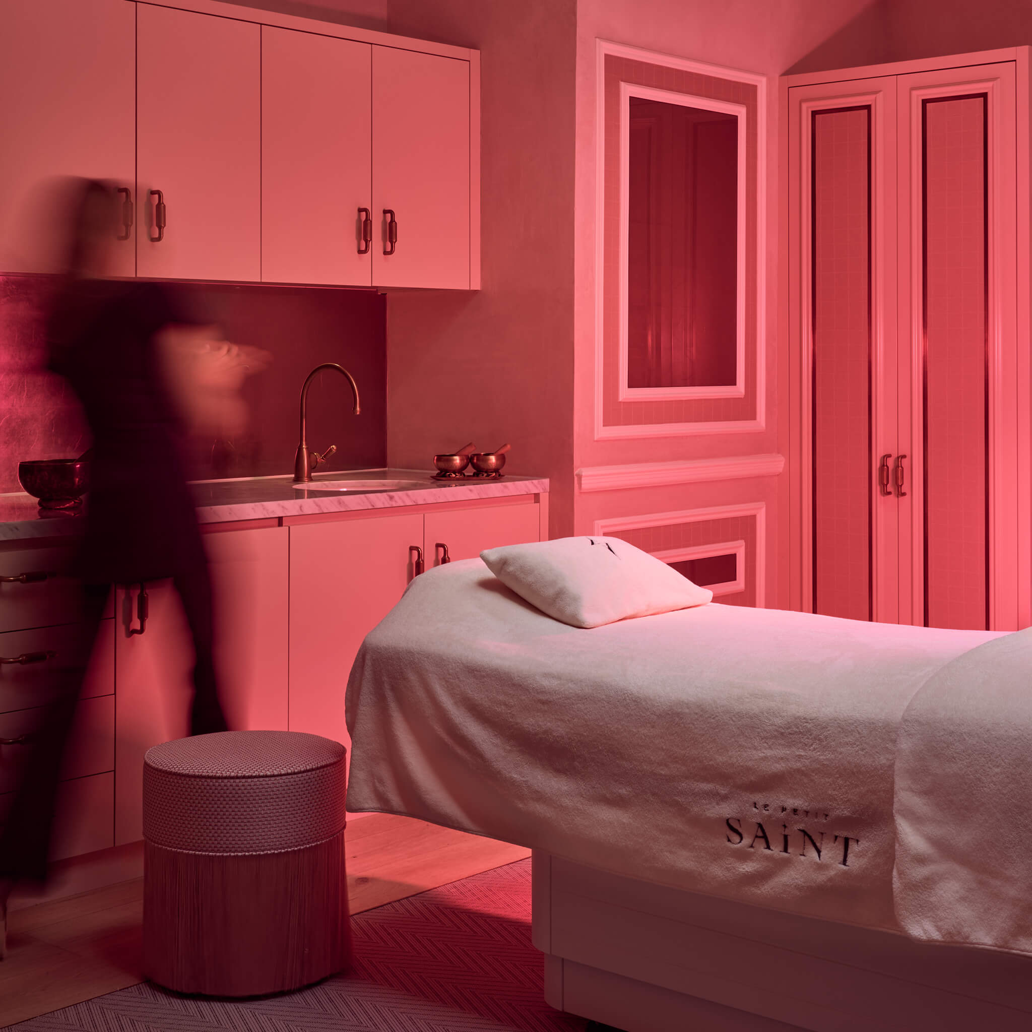 LED Therapy Executive Suite, with Dermal therapist in the background preparing for her next patient. 