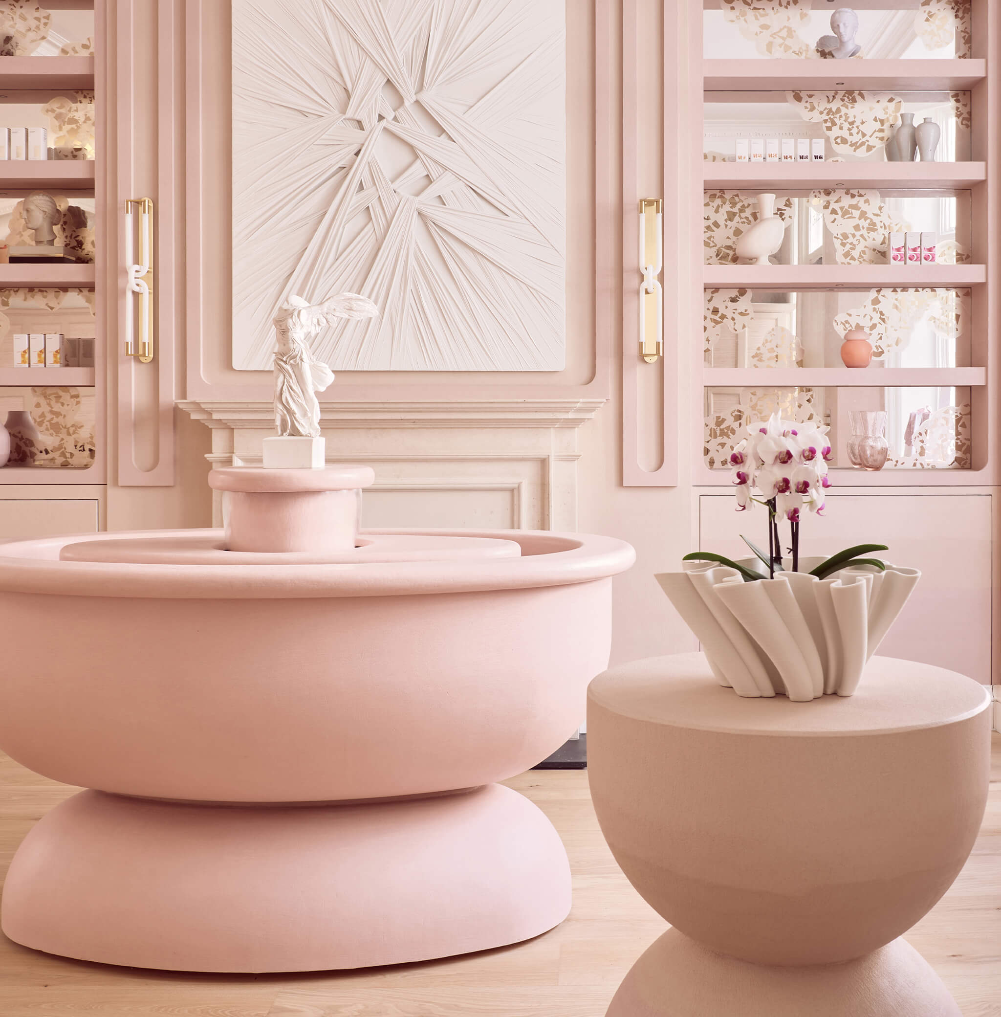 The clinic reception which is the heart of Le Petit Saint, where aesthetic medicine meets artisty and serenity meets wellness.  A truly tranquil space with calmy cinder rose interiors. 