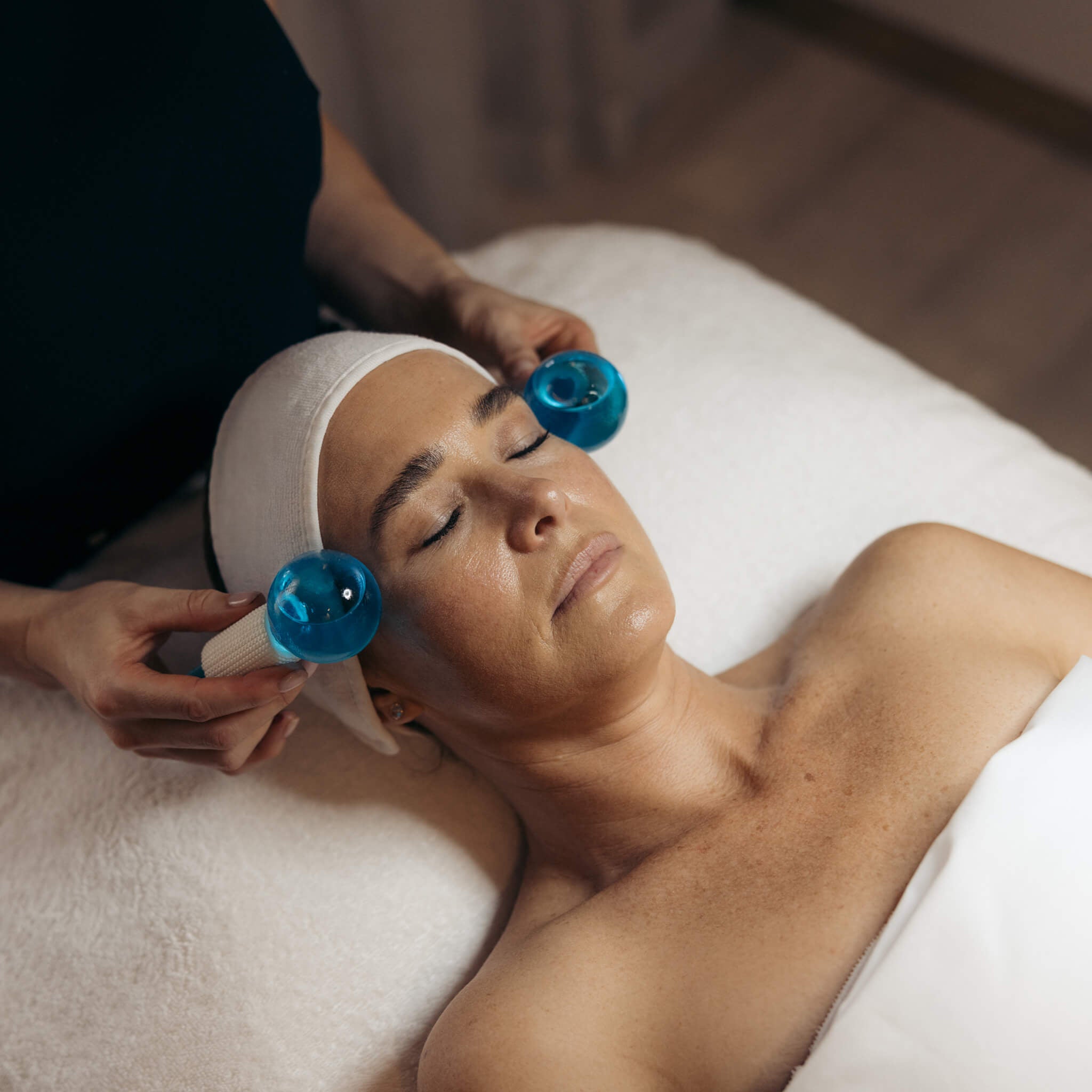 Person receiving a fire & ice facial treatment at Le Petit Saint London 